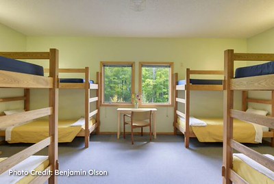 4 sets of bunk beds in a room