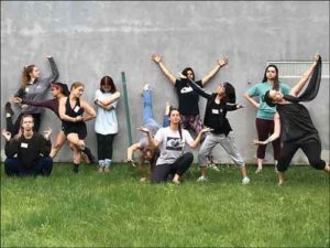dance movement therapy students posing in grass